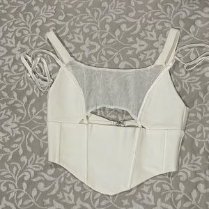 Peekaboo mesh bandage top